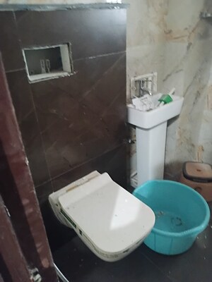 Bathroom in 3 BHK Apartment at Dhakoli – for Sale