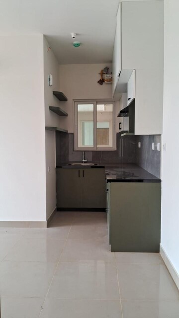 Kitchen in 2 BHK Apartment at Brigade El Dorado, Bagaluru – for Sale