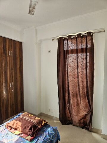 Bedroom in 2 BHK Apartment at Amrapali Princely Estate, Sector 76 – for Rent