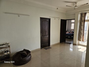 Living Room in 2 BHK Apartment at Amrapali Princely Estate, Sector 76 – for Rent
