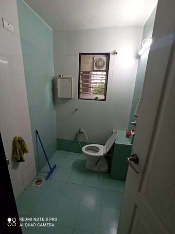 Bathroom in 2 BHK Apartment at Karan Palms, Warje – for Rent