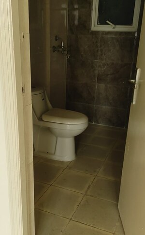 Bathroom in 2 BHK Apartment at Mittal Rajnagar Residency, Raj Nagar Extension – for Sale