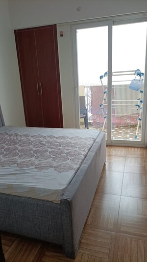 Bedroom in 2 BHK Apartment at Saya Gold Avenue, Vaibhav Khand – for Rent