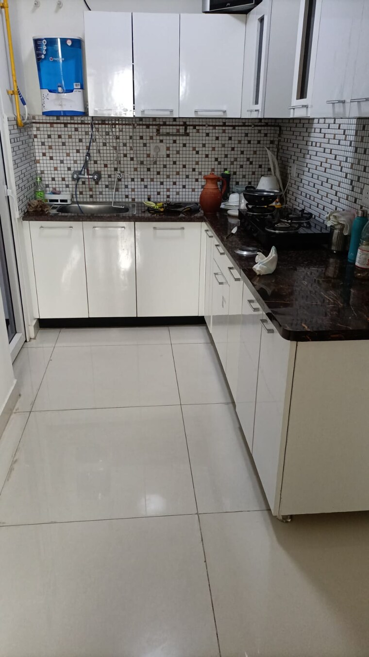 Kitchen, saya-gold-avenue 2 Bedroom 1080 Sq.Ft. Apartment In Vaibhav Khand Ghaziabad 9583706