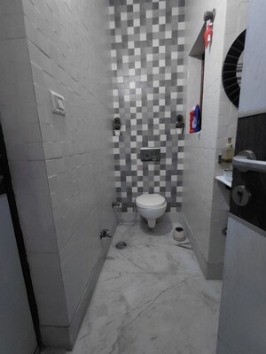 Attached Bathroom in 4 BHK Apartment at Janakpuri – for Sale