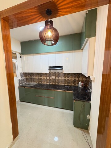 Kitchen in 2 BHK Apartment at Signature The Millennia 3, Sector 37d – for Rent