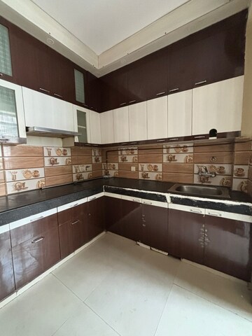 Kitchen in 2 BHK Apartment at Shri Radha Sky Gardens, Sector 16b Greater Noida – for Sale