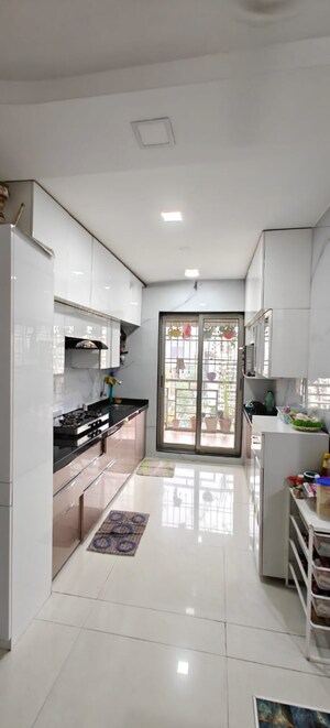 Kitchen in 2.5 BHK Apartment at Shelter Residency, Kharghar – for Sale