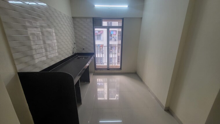 Kitchen, sunrise-parkview-phase-1 2 Bedroom 616 Sq.Ft. Apartment In Shilphata Thane 9584015