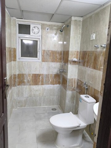 Bathroom in 2 BHK Apartment at Aims Greens Avenue, Sector 4 Greater Noida – for Rent