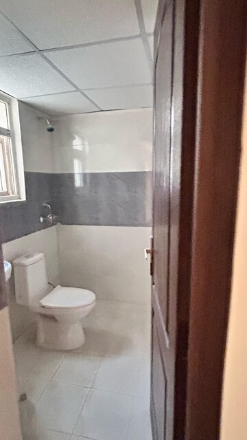 Bathroom in 2 BHK Apartment at Aims Greens Avenue, Sector 4 Greater Noida – for Rent