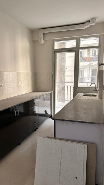 Kitchen in 2 BHK Apartment at Aims Greens Avenue, Sector 4 Greater Noida – for Rent