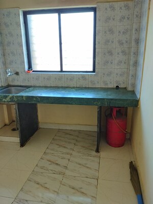 Kitchen in 1 BHK Apartment at Wadgaon Sheri – for Rent
