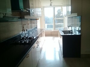 Kitchen in 4 BHK Builder Floor at Defence Colony – for Rent