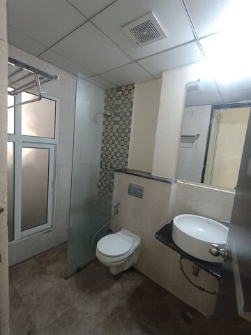 Bathroom in 3 BHK Apartment at Panchsheel Greens, Sector 16 Greater Noida – for Rent