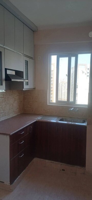 Kitchen in 2 BHK Apartment at Amrapali Golf Homes, Sector 4 Greater Noida – for Rent