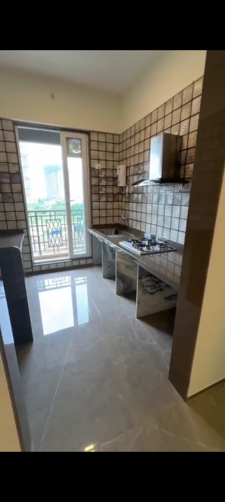 Kitchen, paradise-sai-world-empire 2 Bedroom 846 Sq.Ft. Apartment In Kharghar Navi Mumbai 9585979