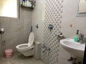 Bathroom in 1 BHK Apartment at Cosmos Orchid, Ghodbunder Road – for Sale
