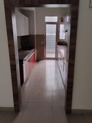 Kitchen in 3.5 BHK Apartment at Emaar Palm Gardens, Sector 83 – for Sale