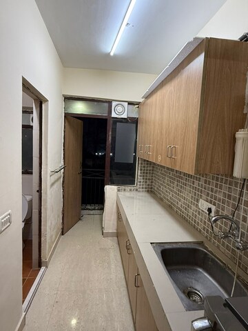 Kitchen in 1 RK Apartment at Suncity Essel Tower, Sector 28 – for Rent