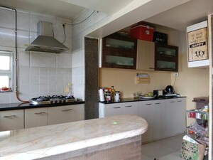 Kitchen in 3 BHK Apartment at NRI Complex Phase 2, Seawoods – for Sale