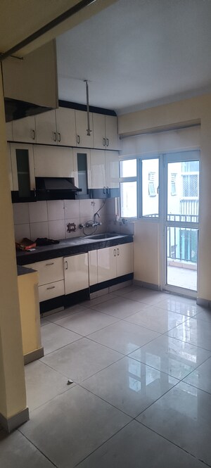 Kitchen in 2 BHK Apartment at Panchsheel Greens, Sector 16 Greater Noida – for Rent