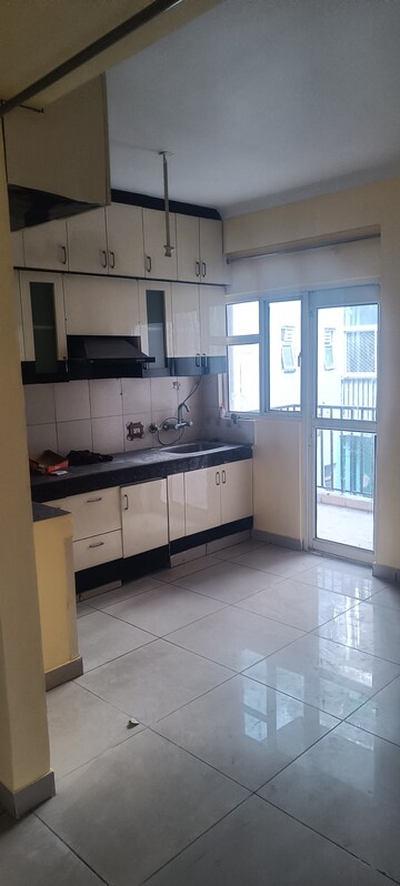 Kitchen in 2 BHK Apartment at Panchsheel Greens, Sector 16 Greater Noida – for Rent