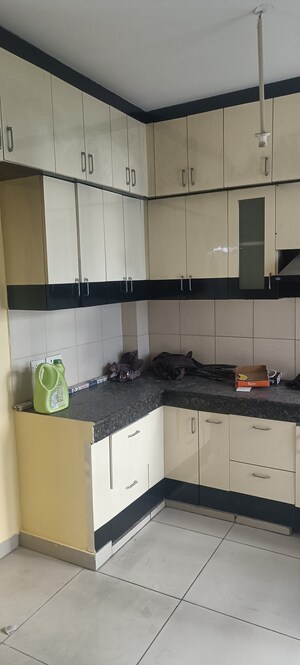 Kitchen in 2 BHK Apartment at Panchsheel Greens, Sector 16 Greater Noida – for Rent
