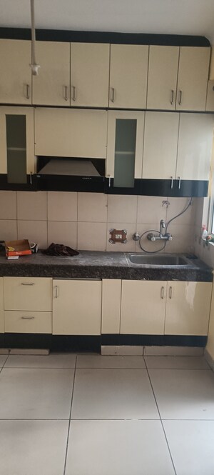 Kitchen in 2 BHK Apartment at Panchsheel Greens, Sector 16 Greater Noida – for Rent