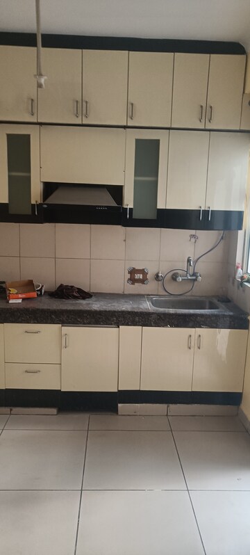 Kitchen in 2 BHK Apartment at Panchsheel Greens, Sector 16 Greater Noida – for Rent