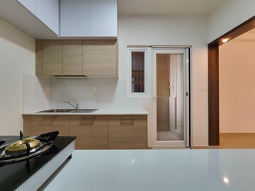 Kitchen in 3.5 BHK Apartment at Bhartiya Nikoo Homes Phase 2, Thanisandra Main Road – for Rent