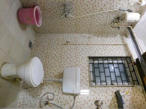 Bathroom in 2 BHK Apartment at Royal Palms, Goregaon East – for Rent