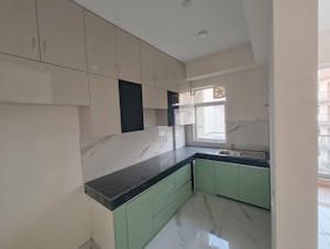 Kitchen in 2.5 BHK Apartment at Smart World Gems, Sector 89 – for Sale
