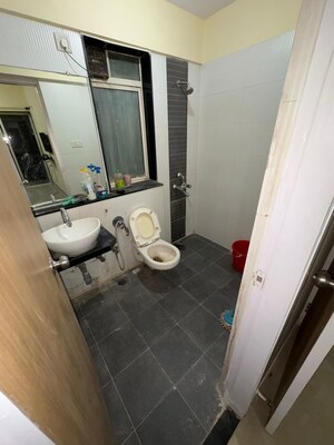 Bathroom in 1 BHK Apartment at DB Realty Parkwoods, Kasarvadavali – for Rent