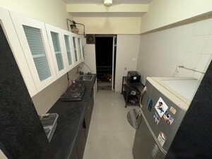 Kitchen in 1 BHK Apartment at DB Realty Parkwoods, Kasarvadavali – for Rent