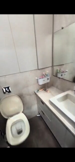 Bathroom in 2 BHK Apartment at Gundecha Symphony, Andheri West – for Rent