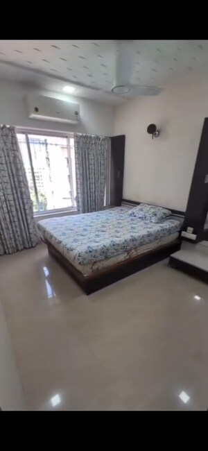Bedroom in 2 BHK Apartment at Gundecha Symphony, Andheri West – for Rent