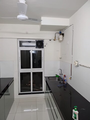 Kitchen in 2 BHK Apartment at Godrej Emerald, Ghodbunder Road – for Rent