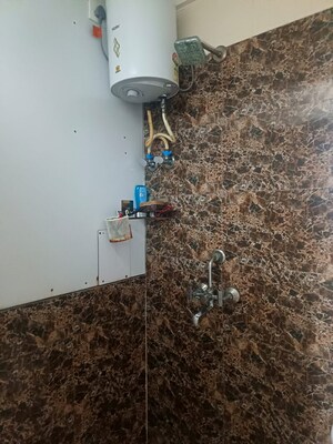 Bathroom in 2 BHK Apartment at RWA Apartments Sector 19, Sector 19 – for Rent