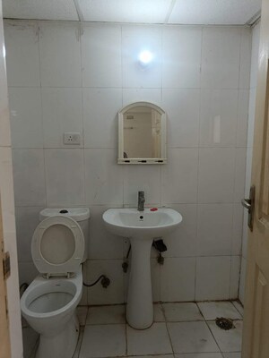 Bathroom in 3 BHK Apartment at RWA Apartments Sector 26, Sector 26 – for Rent