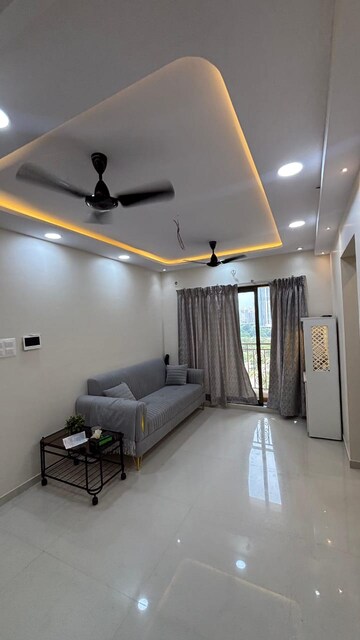 Living Room in 1 BHK Apartment at KM Horizon Exotica, Haware City – for Rent