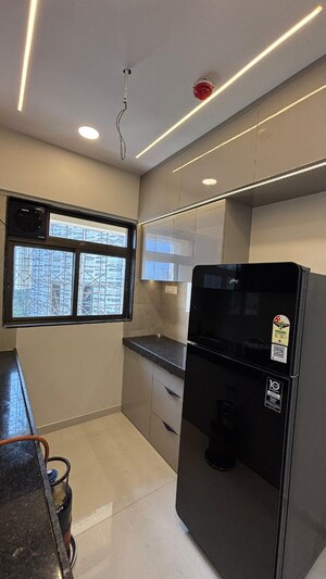 Kitchen in 1 BHK Apartment at KM Horizon Exotica, Haware City – for Rent