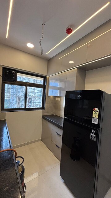 Kitchen in 1 BHK Apartment at KM Horizon Exotica, Haware City – for Rent
