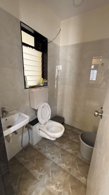 Bathroom in 1 BHK Apartment at KM Horizon Exotica, Haware City – for Rent