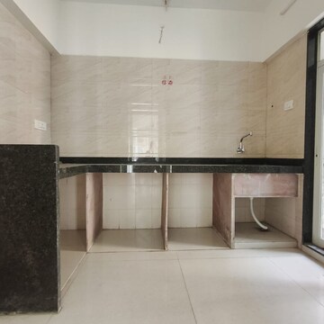 Kitchen in 2 BHK Apartment at Bhagwati Belmont, Haware City – for Rent