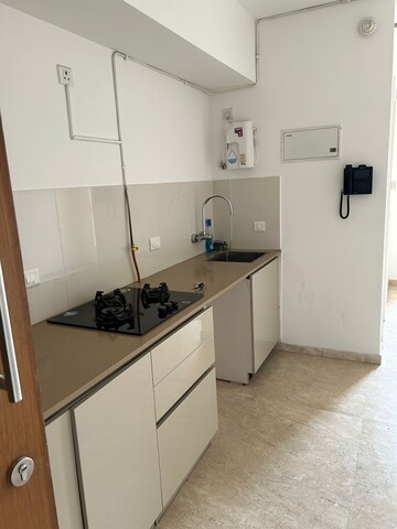 Kitchen in Studio Apartment at Hiranandani Estate Solitaire C, Ghodbunder Road – for Sale