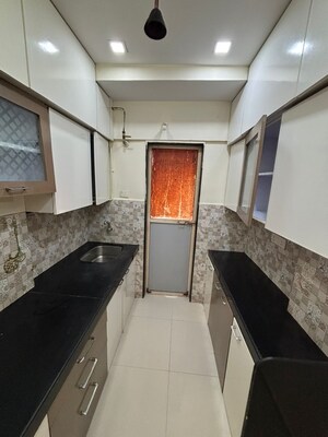 Kitchen in 1 BHK Apartment at Bhoomi Acres, Thane West – for Rent