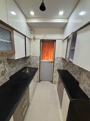 Kitchen in 1 BHK Apartment at Bhoomi Acres, Thane West – for Rent
