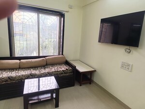 Living Room in 2 BHK Apartment at Jai Ashoka CHS, Goregaon East – for Rent