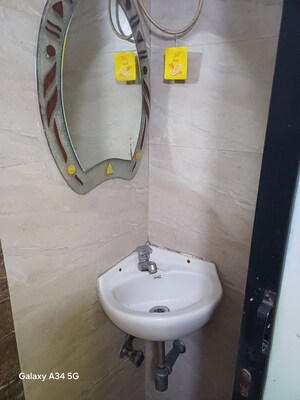 Bathroom in 2 BHK Apartment at Kopar Khairane – for Rent